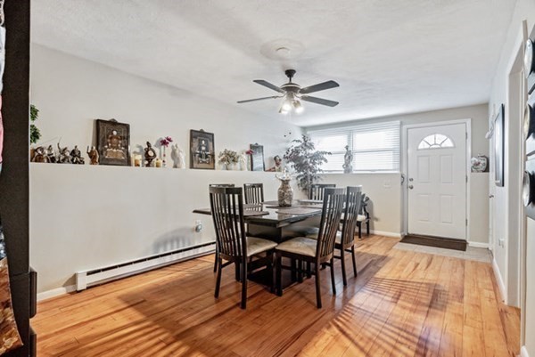 25 Osborne Street Lynn, MA 01905 - Photo 21 of 40 a view of a dining room with furniture and wooden floor