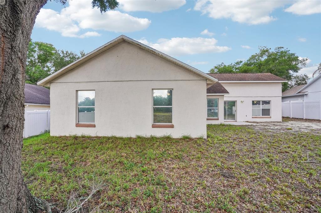 2596 Alclobe Circle Ocoee, FL 34761 - Photo 57 of 70 a view of a house with a yard