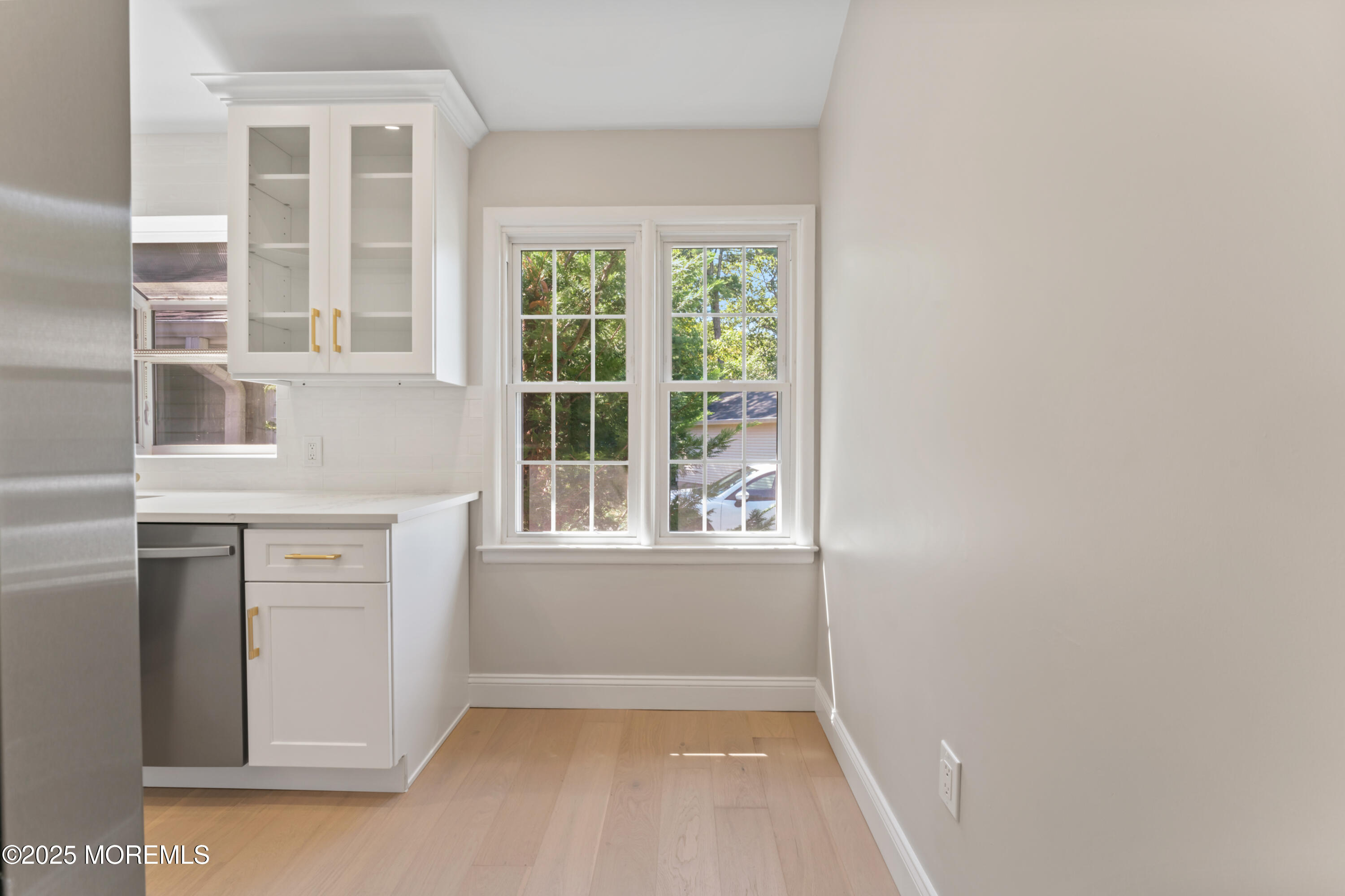 23 Mulberry Court, Unit D Brielle, NJ 08730 - Photo 12 of 40 an empty room with windows