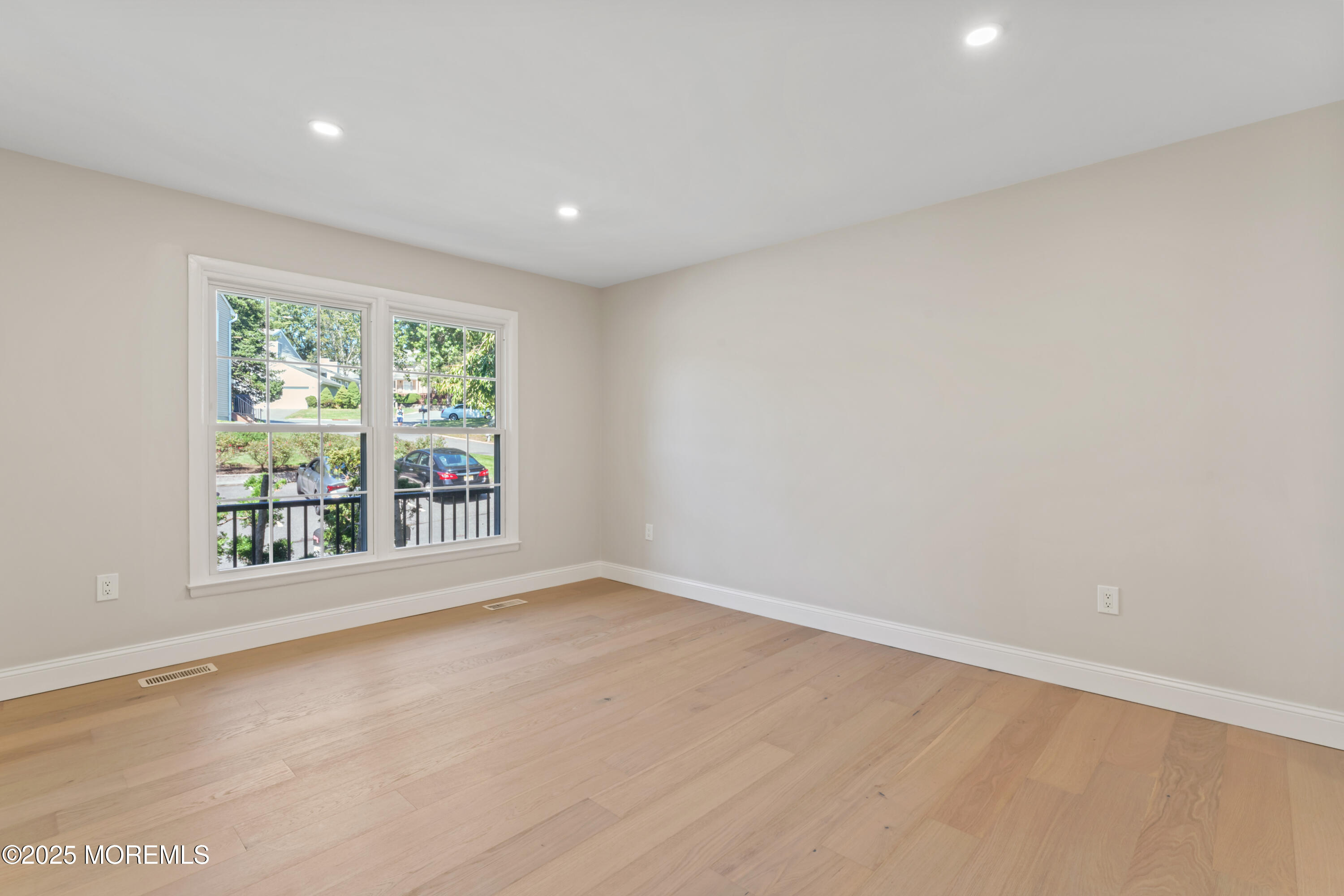 23 Mulberry Court, Unit D Brielle, NJ 08730 - Photo 14 of 40 a view of an empty room with a window