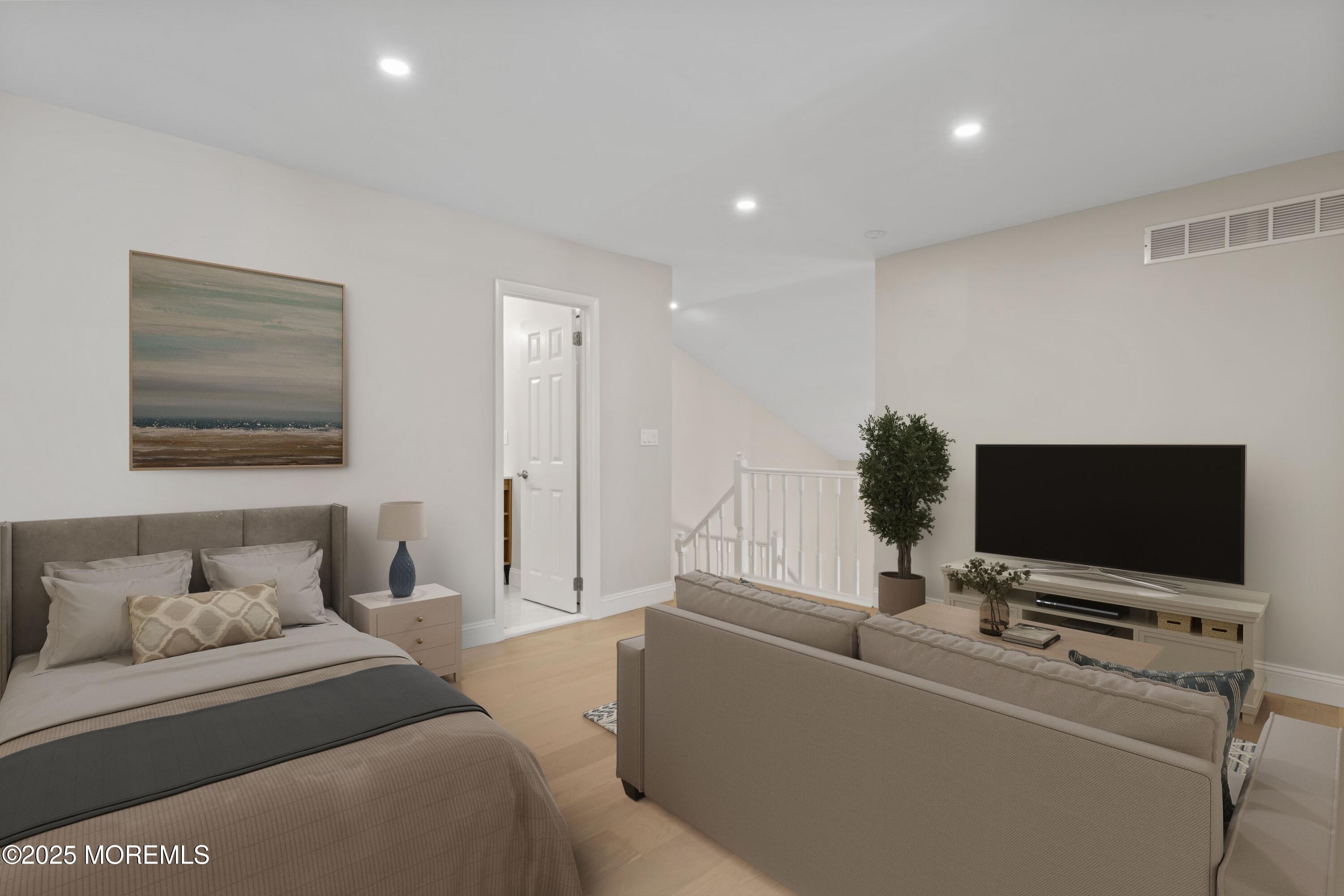 23 Mulberry Court, Unit D Brielle, NJ 08730 - Photo 18 of 40 a living room with furniture and a flat screen tv