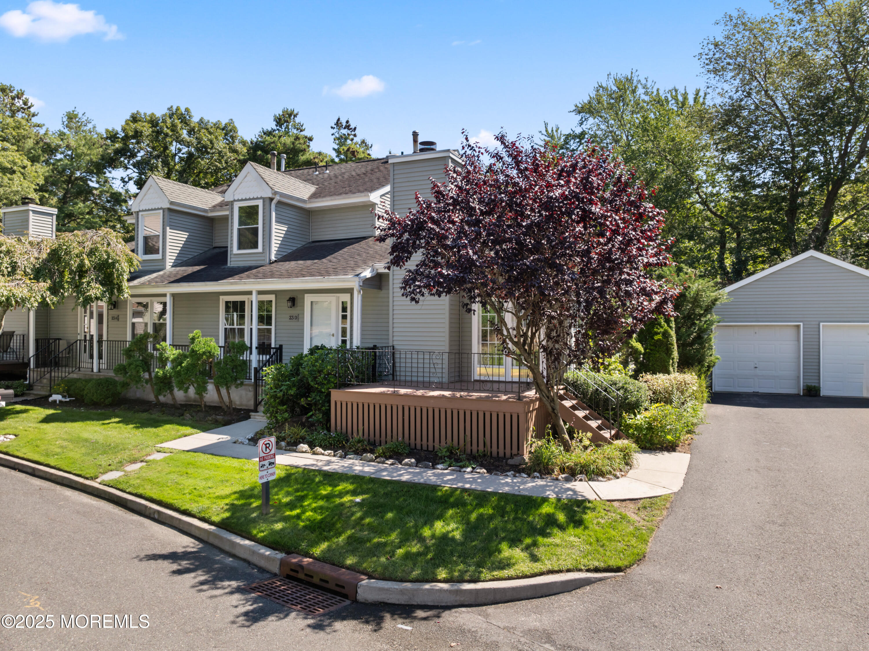 23 Mulberry Court, Unit D Brielle, NJ 08730 - Photo 2 of 40 a view of house with yard and outdoor seating