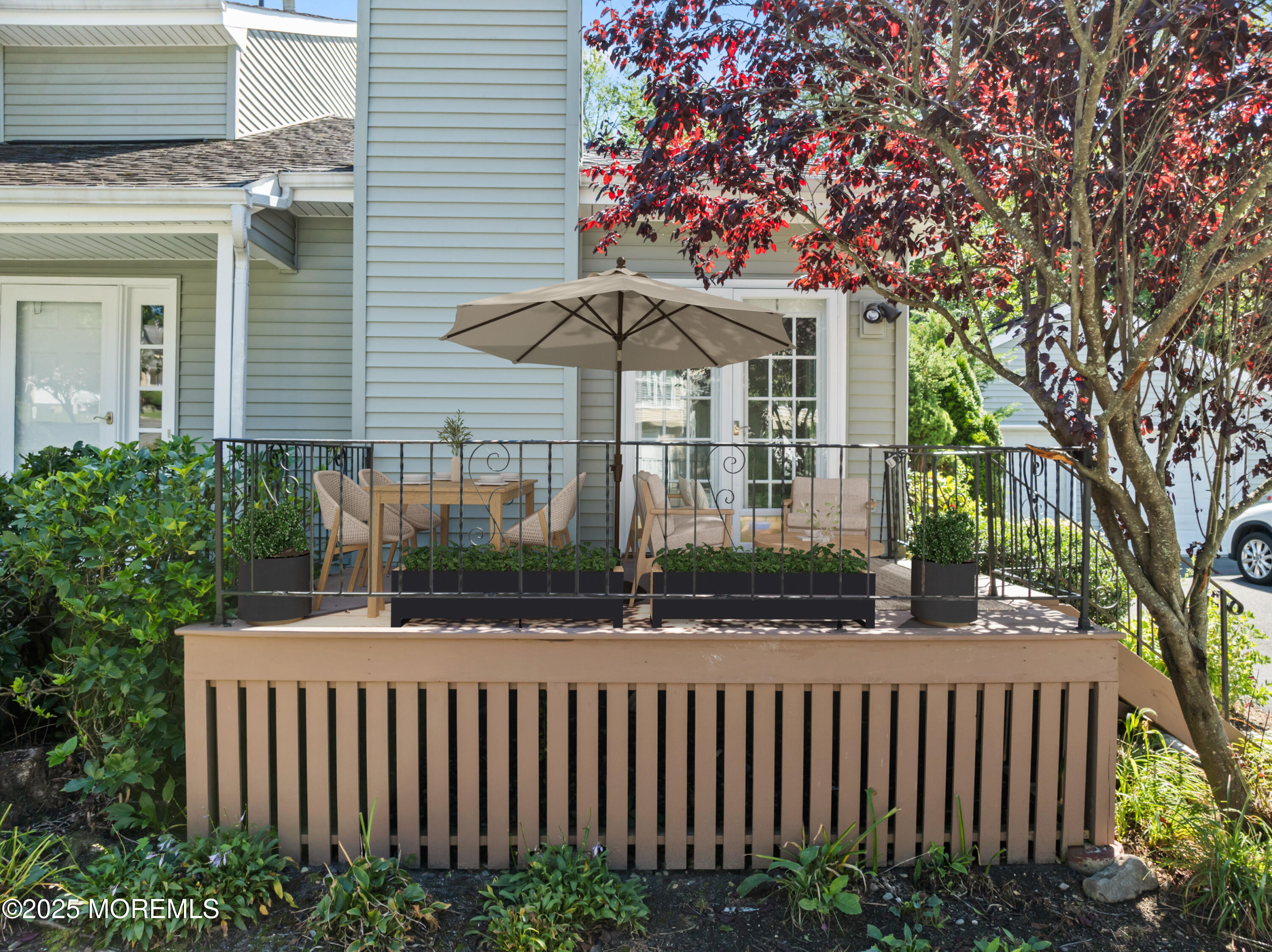 23 Mulberry Court, Unit D Brielle, NJ 08730 - Photo 29 of 40 a front view of a house with a garden