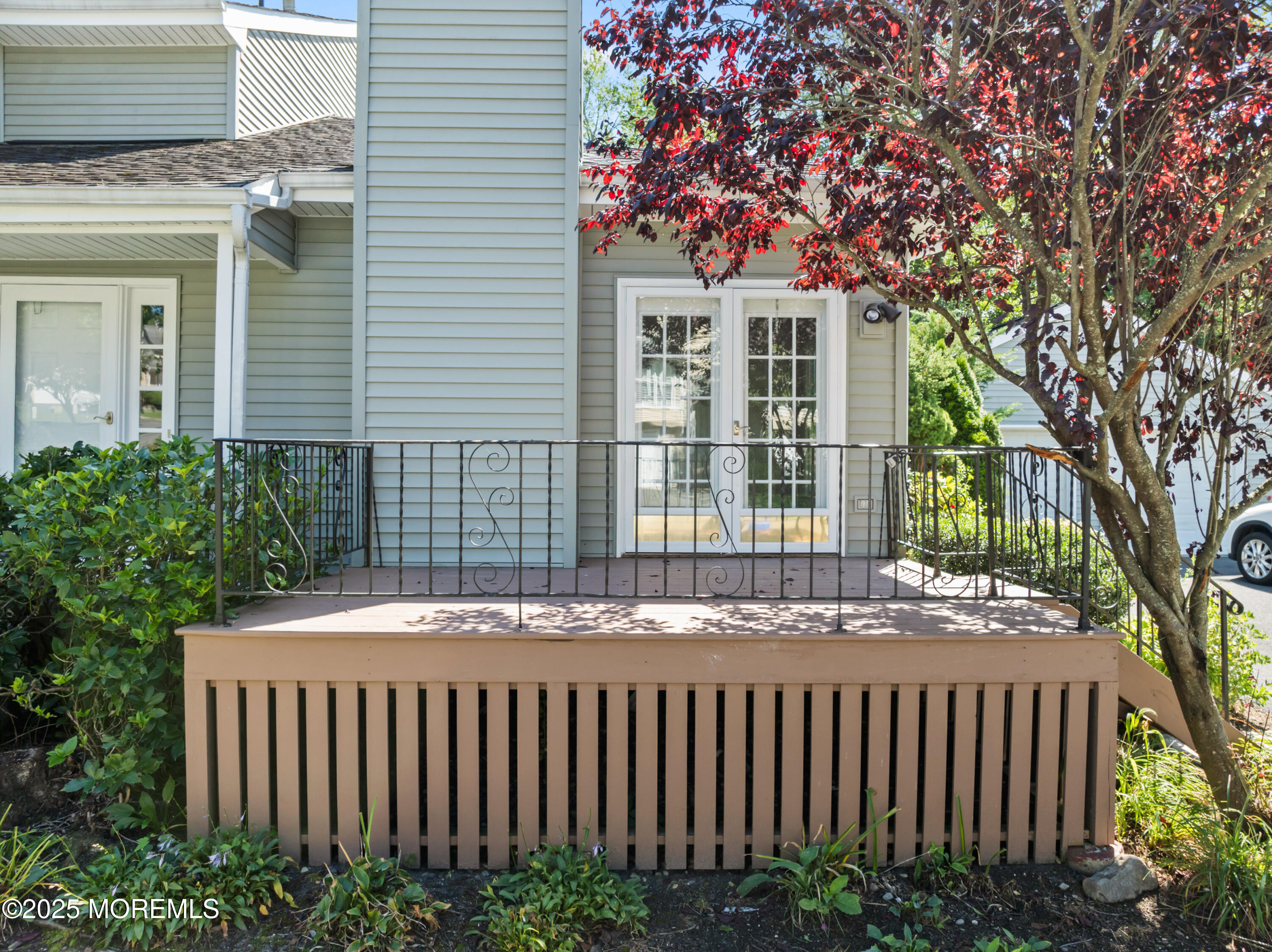 23 Mulberry Court, Unit D Brielle, NJ 08730 - Photo 30 of 40 a front view of a house with a garden
