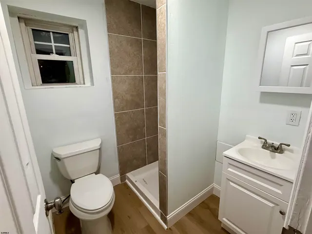 a bathroom with a toilet and a sink