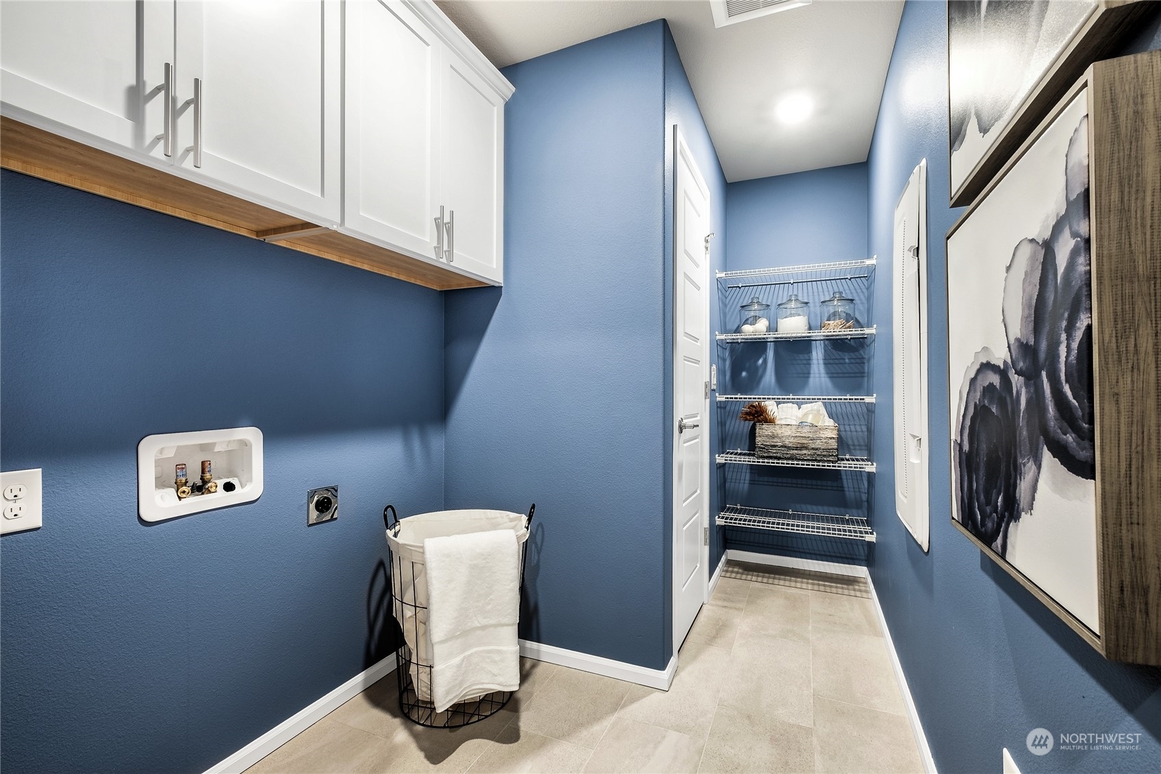 21113 42nd Avenue Southeast, Unit 120 Bothell, WA 98021 - Photo 11 of 16 a view of a hallway with washer and dryer