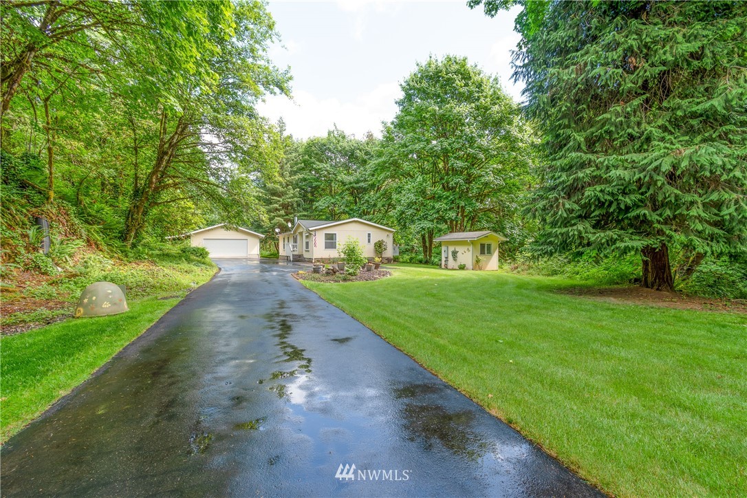 106 Slide Creek Road Longview, WA 98632 - Photo 1 of 38 a view of a house with a yard