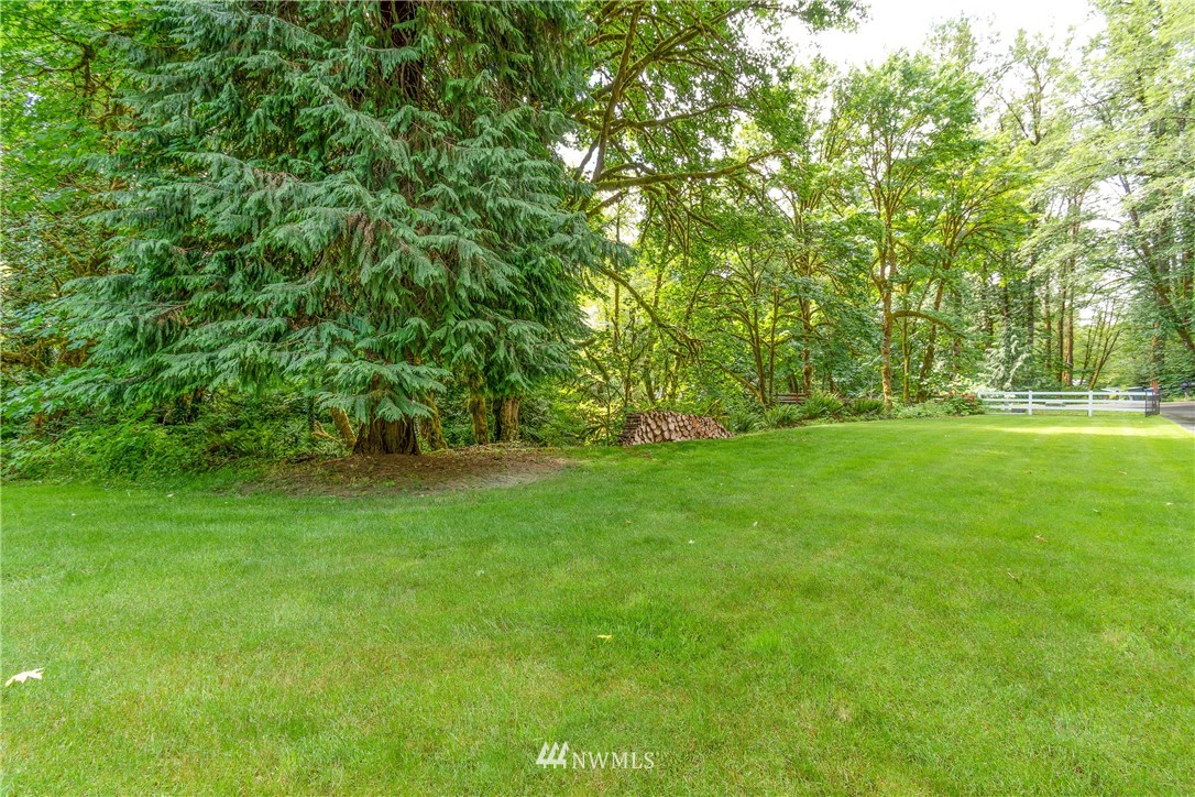 106 Slide Creek Road Longview, WA 98632 - Photo 11 of 38 a view of green field with trees in the background