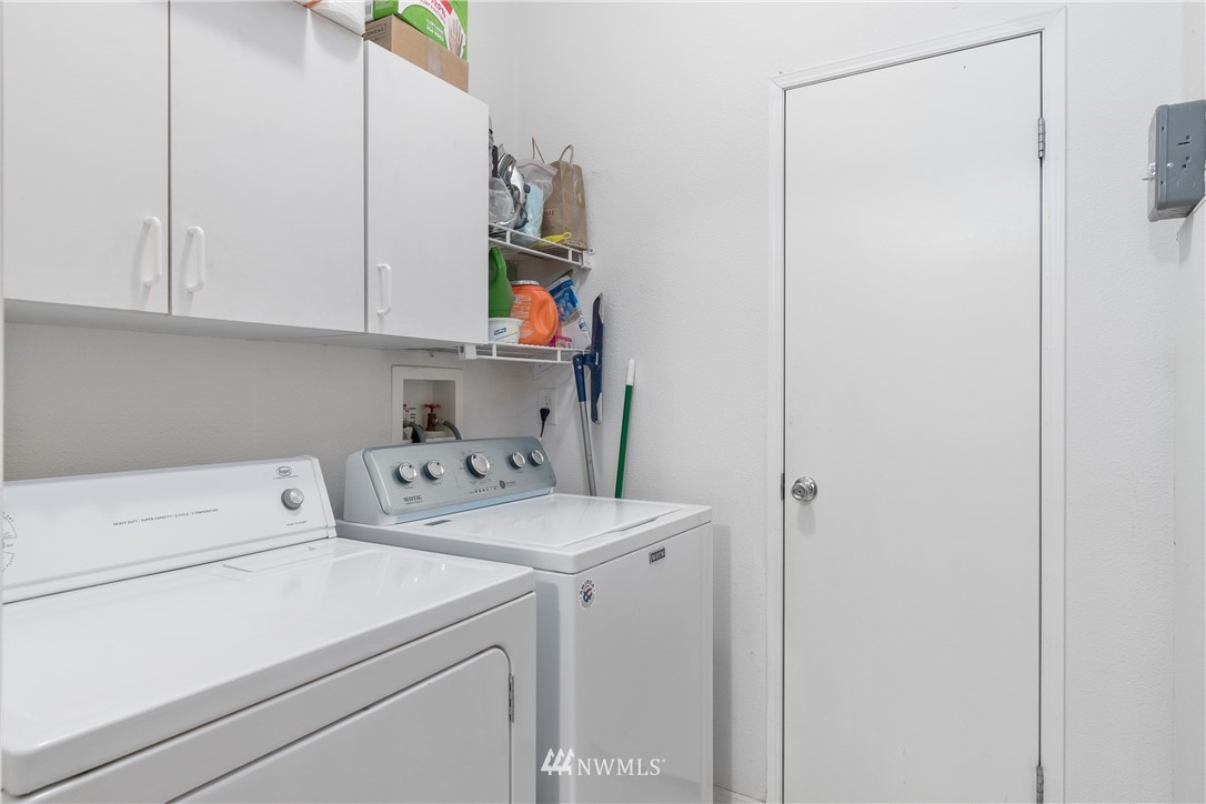 106 Slide Creek Road Longview, WA 98632 - Photo 29 of 38 a utility room with dryer and washer