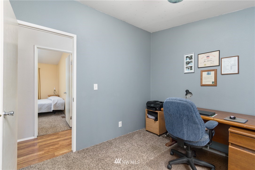 106 Slide Creek Road Longview, WA 98632 - Photo 34 of 38 a view of a workspace with furniture and a window