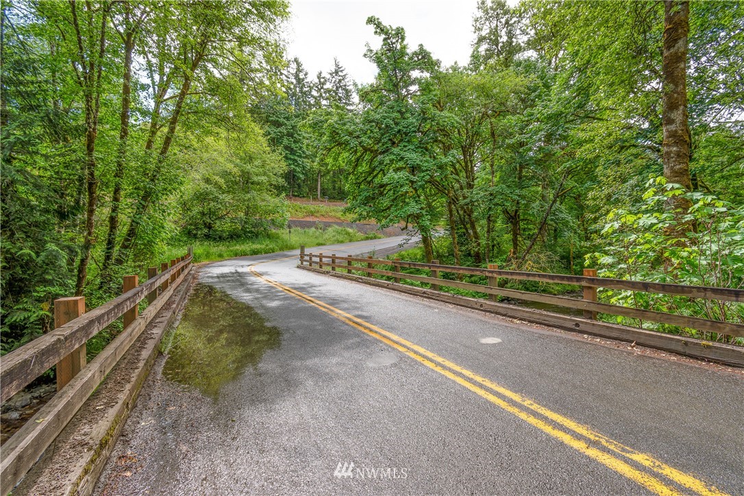 106 Slide Creek Road Longview, WA 98632 - Photo 37 of 38 a view of a road with a yard