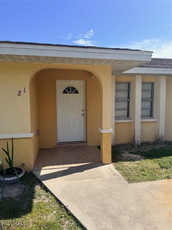 721 Gilbert Avenue South Lehigh Acres, FL 33973 - Photo 3 of 13 a front view of a house