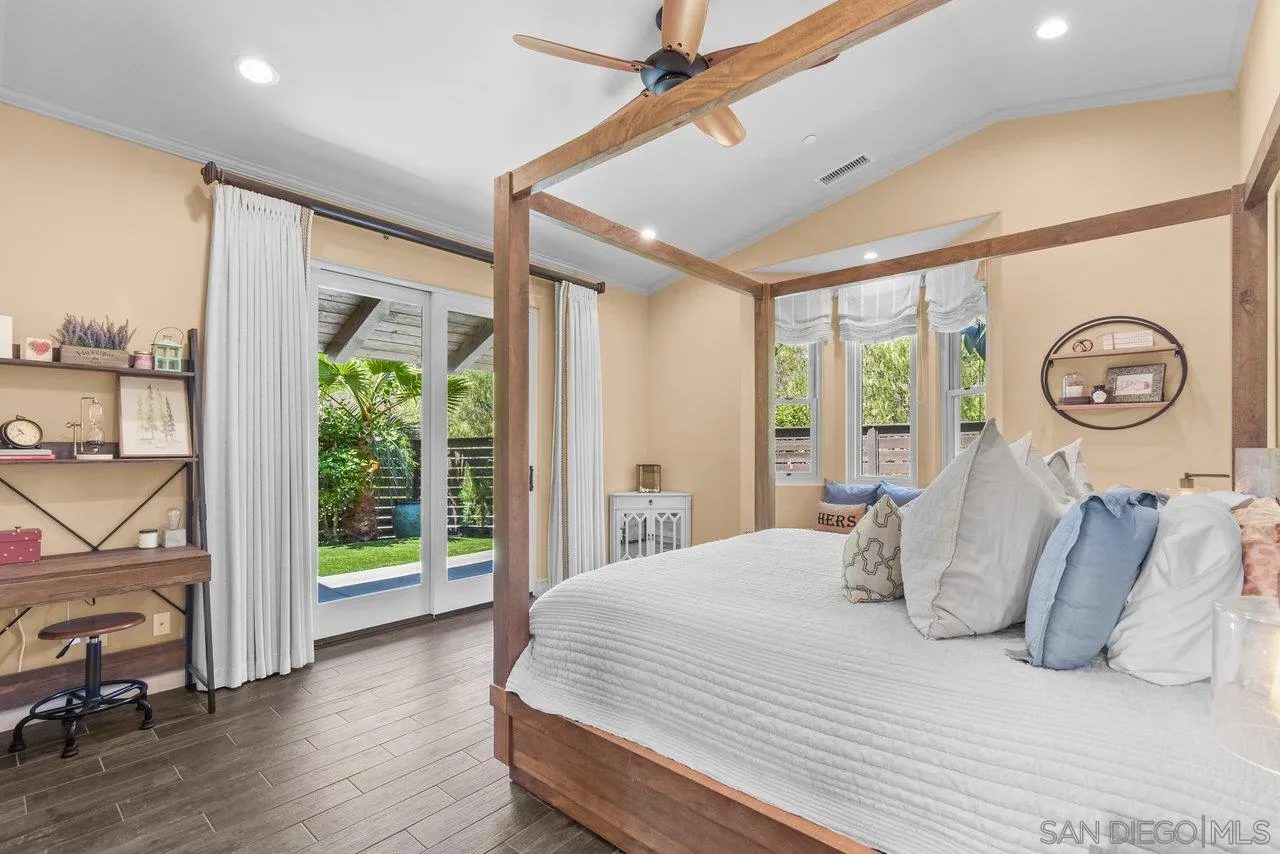 2868 Harper Ranch Road Jamul, CA 91935 - Photo 22 of 59 a bedroom with a large bed and a window