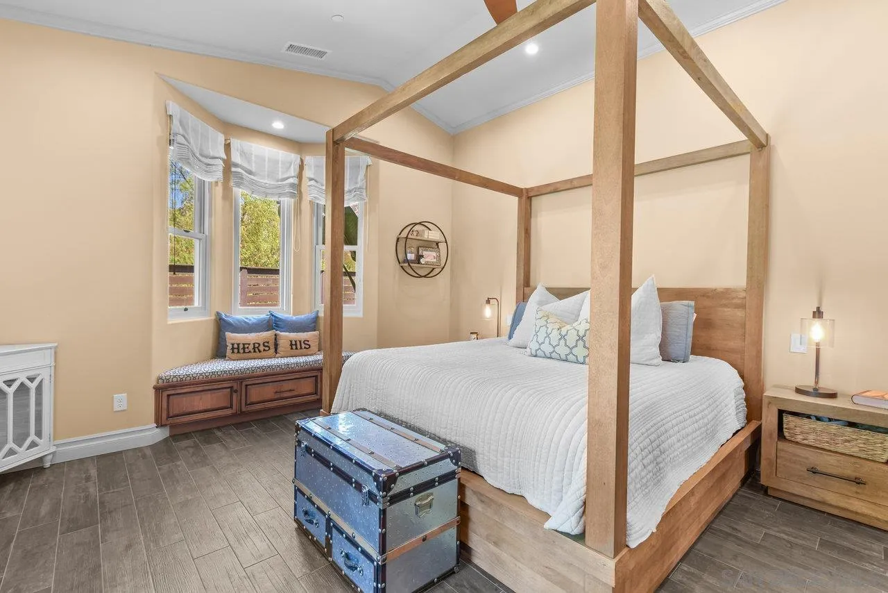 2868 Harper Ranch Road Jamul, CA 91935 - Photo 23 of 59 a bedroom with a bed and a large window