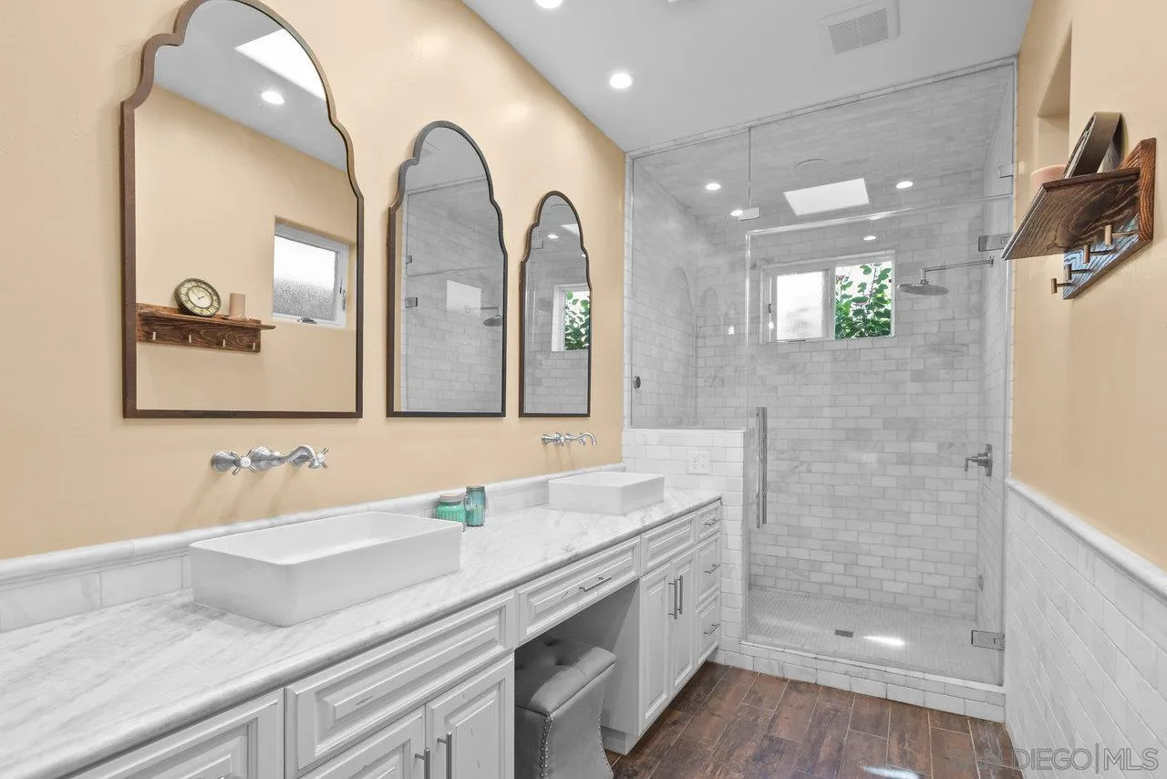 2868 Harper Ranch Road Jamul, CA 91935 - Photo 26 of 59 a bathroom with a double vanity sink and mirror