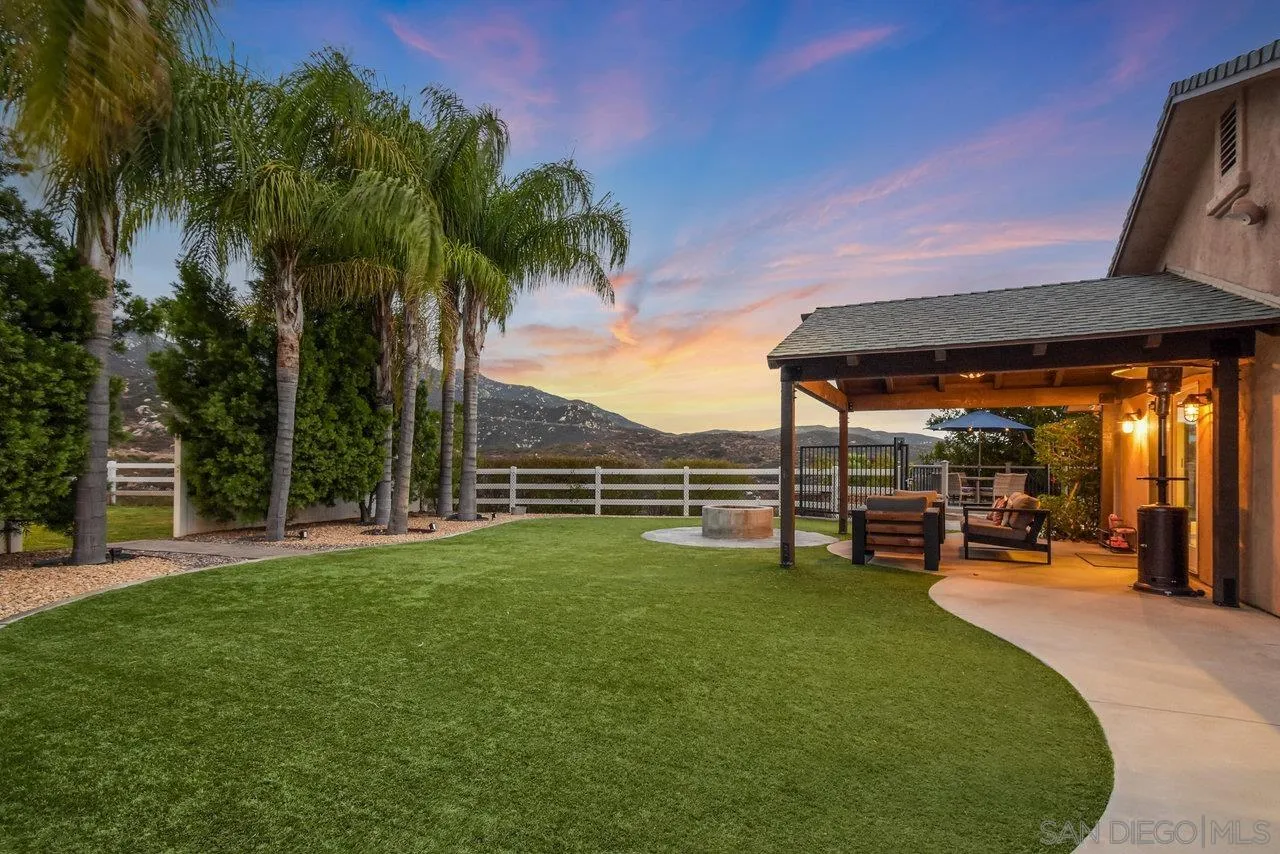 2868 Harper Ranch Road Jamul, CA 91935 - Photo 59 of 59 a view of a backyard with a sitting area and slide