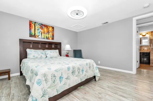 a view of a lake with a bench next to both side of lake