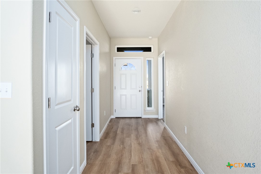 3211 Llano Alto Circle Temple, TX 76504 - Photo 6 of 29 a view of a hallway with wooden floor