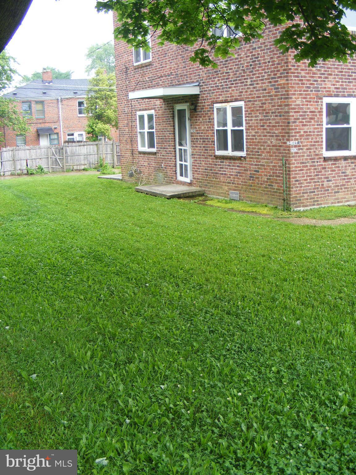 8503 Chestnut Oak Road Baltimore, MD 21234 - Photo 3 of 13 a view of a house with a yard
