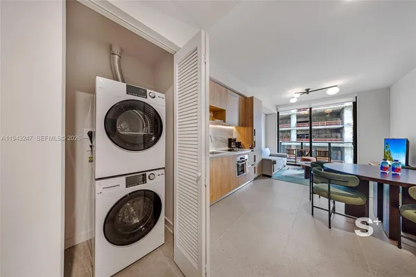 a view of a living room washer and dryer