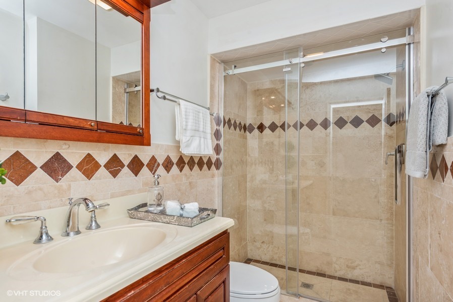 223 Brookbridge Road Trout Valley, IL 60013 - Photo 17 of 33 a bathroom with a sink a toilet and shower