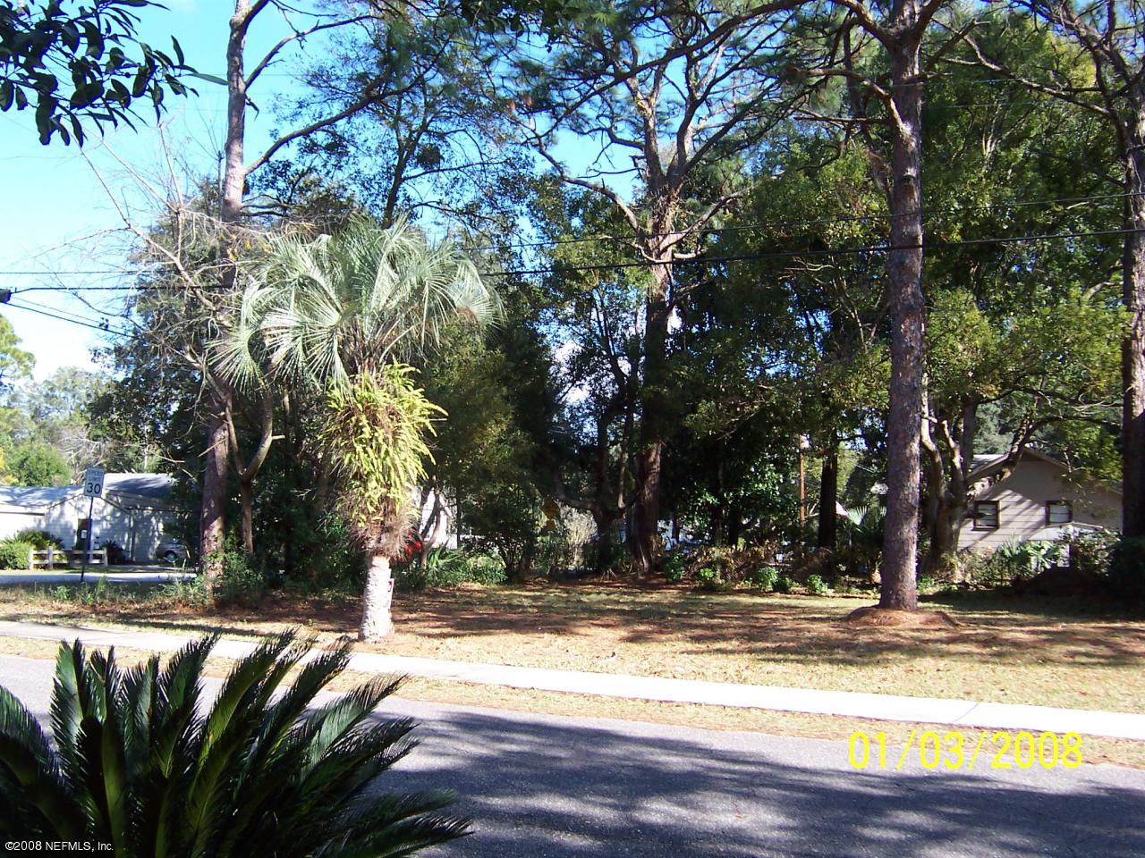 0 Somerset Road Jacksonville, FL 32210 - Photo 2 of 2 a view of a house with snow on the road
