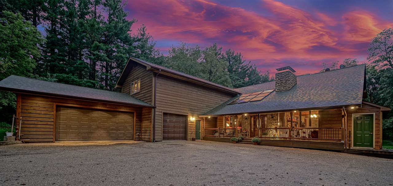 1052 South Harmony Road Oregon, IL 61061 - Photo 1 of 25 a view of a house with a garage
