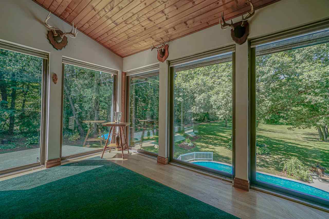 1052 South Harmony Road Oregon, IL 61061 - Photo 13 of 25 a view of a porch with a big yard