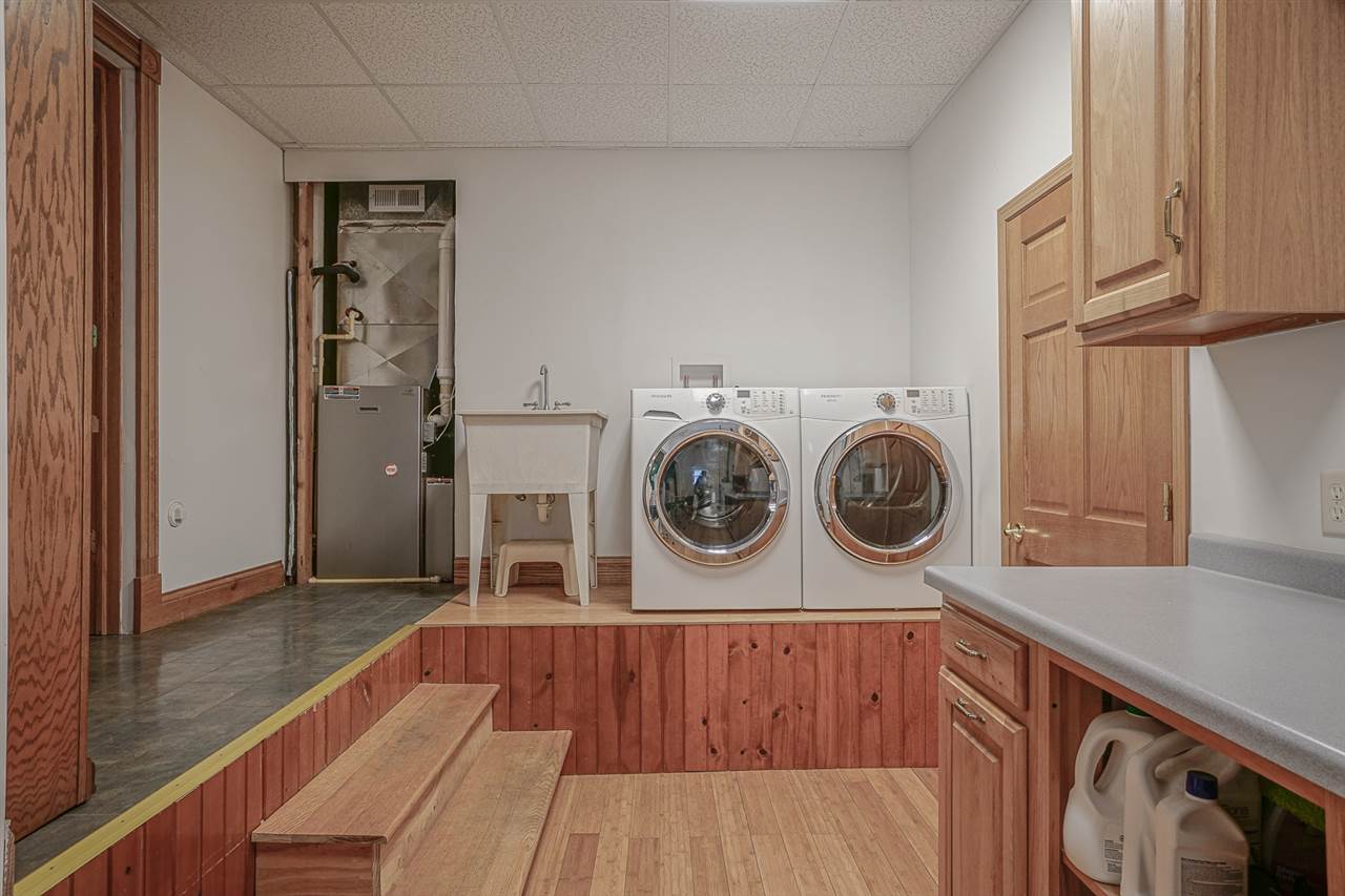 1052 South Harmony Road Oregon, IL 61061 - Photo 20 of 25 a view of storage and utility room with washer and dryer