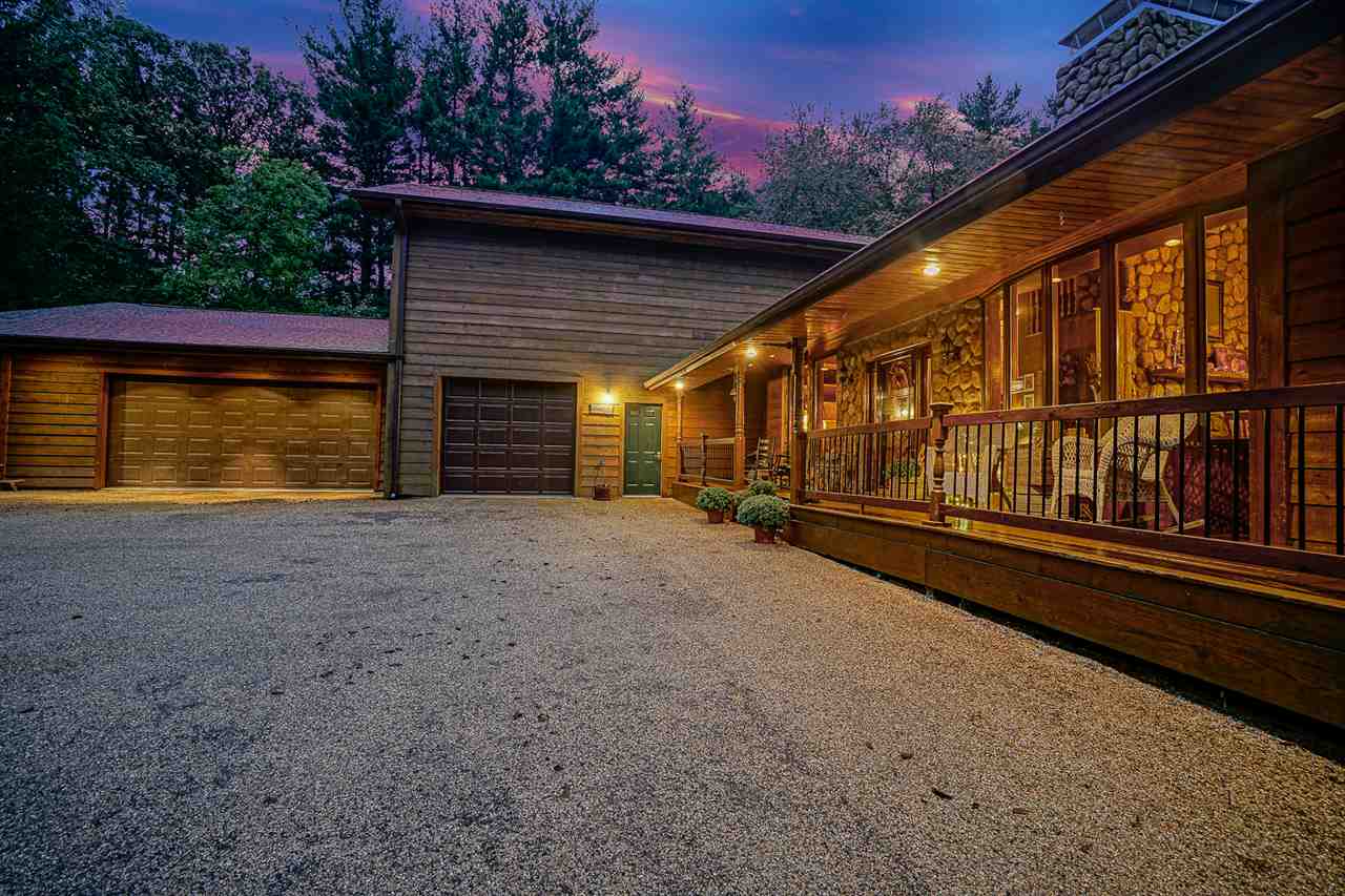 1052 South Harmony Road Oregon, IL 61061 - Photo 2 of 25 a view of swimming pool with an outdoor seating