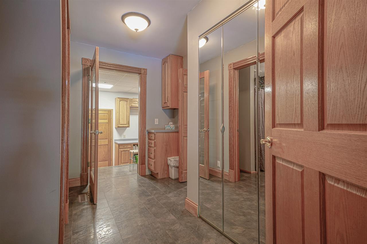 1052 South Harmony Road Oregon, IL 61061 - Photo 24 of 25 wooden floor with a bathroom