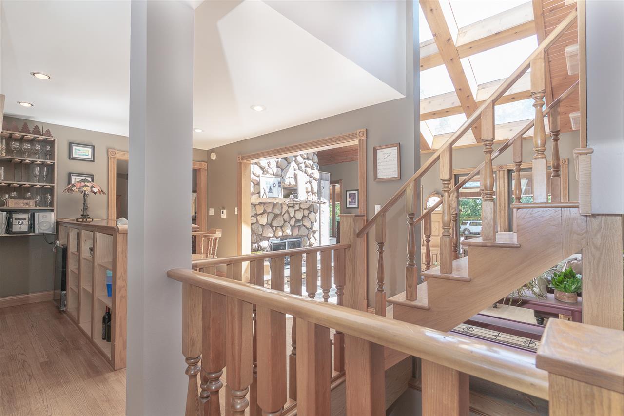 1052 South Harmony Road Oregon, IL 61061 - Photo 5 of 25 a view of an entryway with wooden floor and stairs