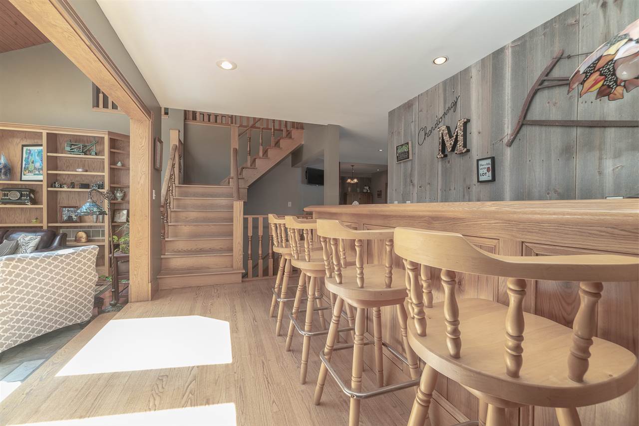 1052 South Harmony Road Oregon, IL 61061 - Photo 8 of 25 a balcony with table and chairs