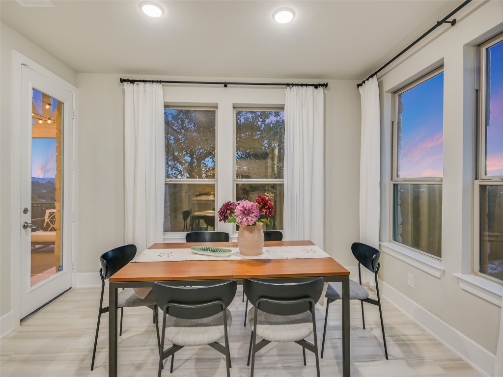 2610 Sunset Vista Circle, Unit 16 Spicewood, TX 78669 - Photo 13 of 28 Dining room featuring light wood-type flooring and recessed lighting