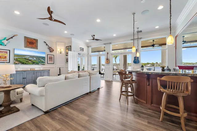 a spacious bathroom with a granite countertop sink a toilet and a shower