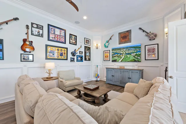 a bedroom with a large bed and a view of bedroom