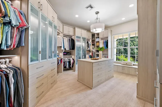 a kitchen with stainless steel appliances a stove sink and cabinets