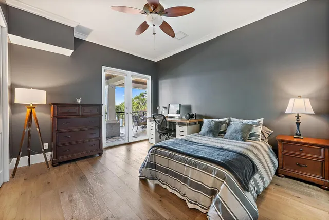 a view of a house with a swimming pool and a yard