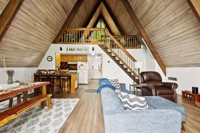 a view of a living room and a wooden floor