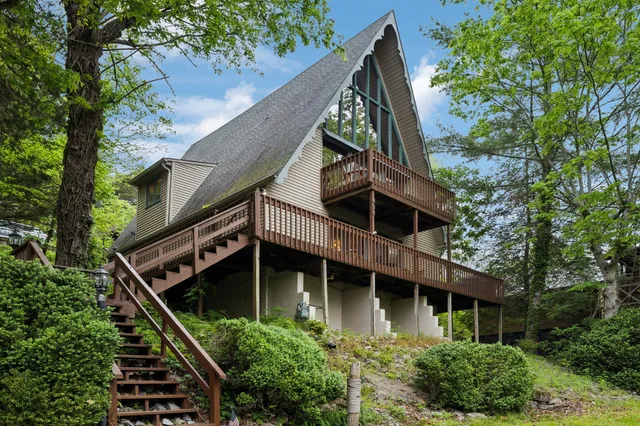 a house with trees in front of it
