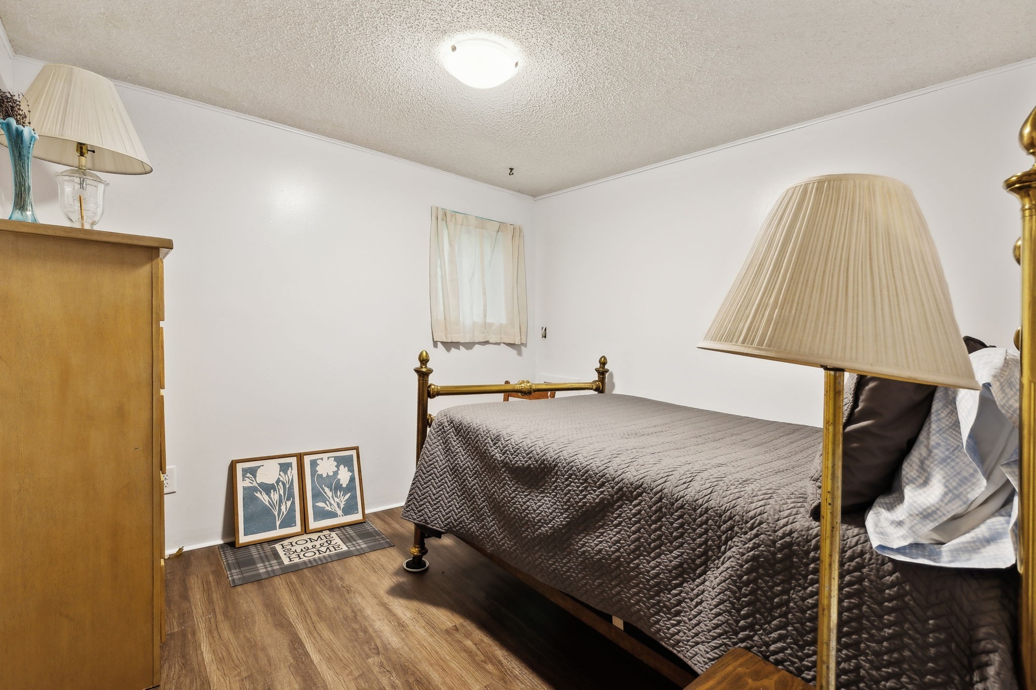 404 Duke Circle Lancaster, TN 38569 - Photo 27 of 43 a bedroom with a bed and a walk in closet