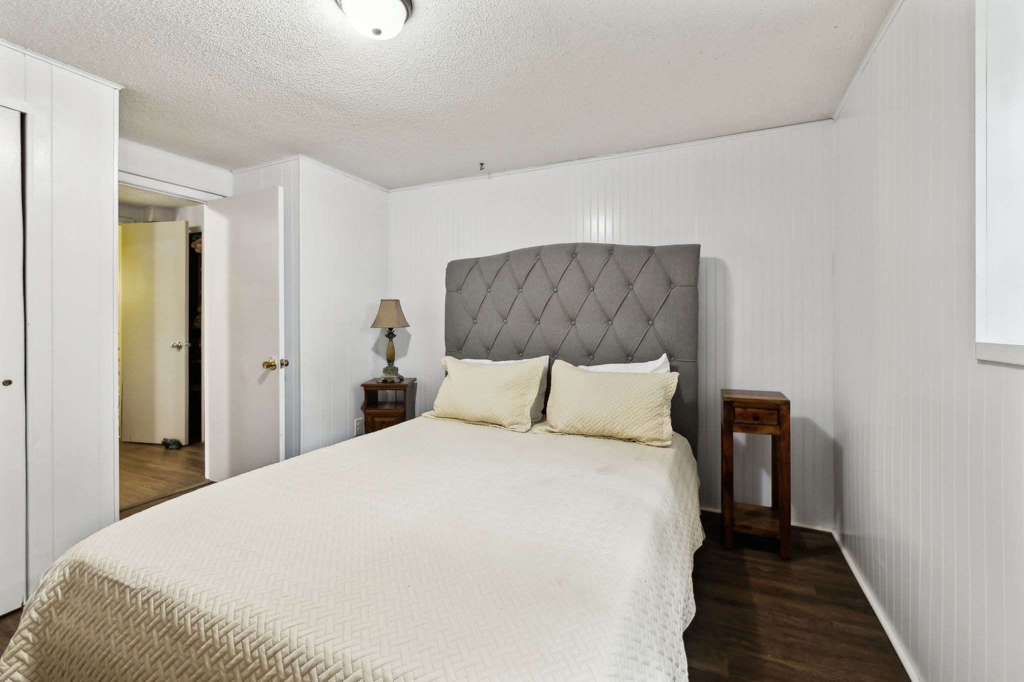 404 Duke Circle Lancaster, TN 38569 - Photo 31 of 43 a large bed in a bedroom next to a window