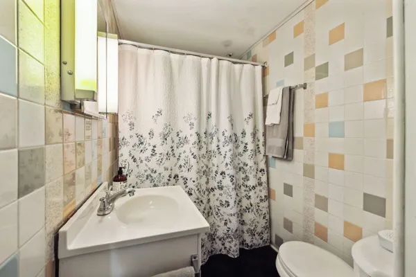 a view of balcony with floor to ceiling window wooden floor and a floor to ceiling window