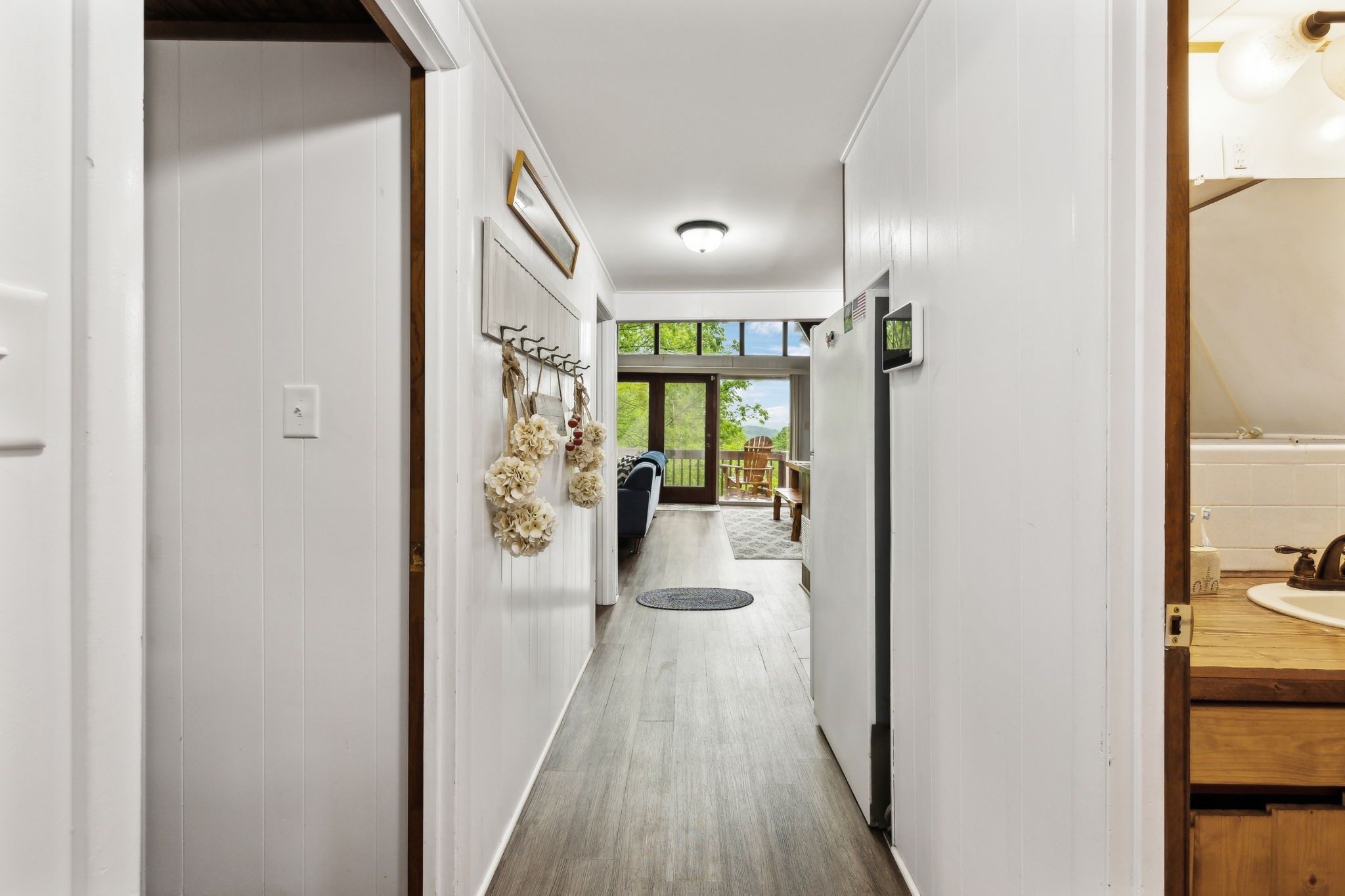 404 Duke Circle Lancaster, TN 38569 - Photo 5 of 43 a view of a hallway with wooden floor