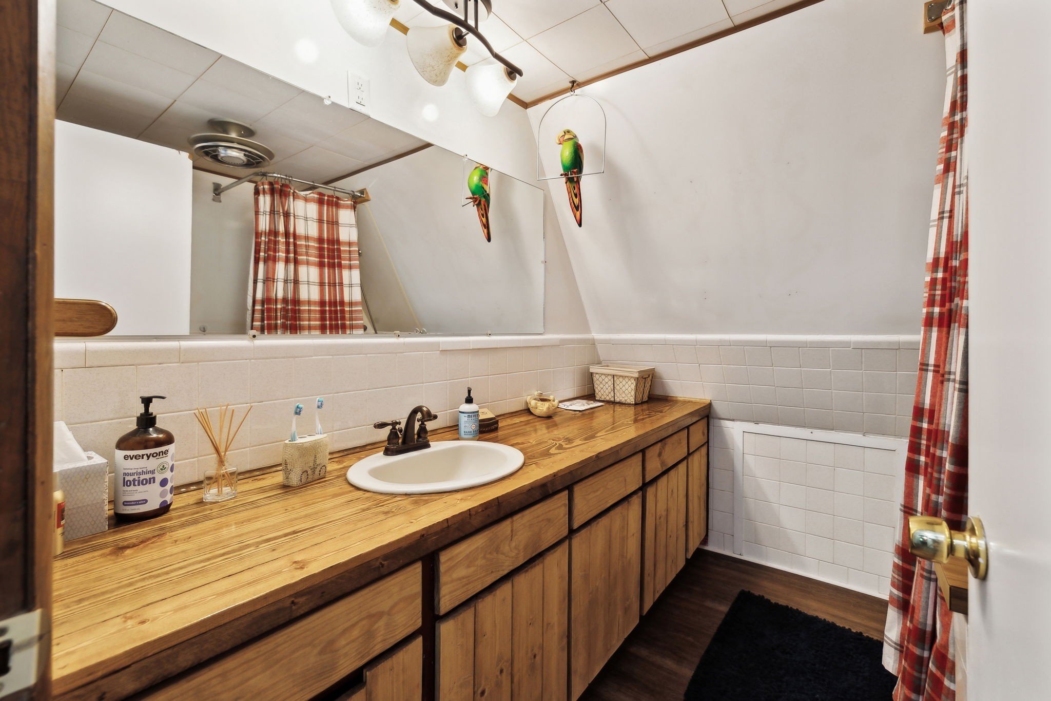 404 Duke Circle Lancaster, TN 38569 - Photo 8 of 43 a bathroom with a sink and a mirror