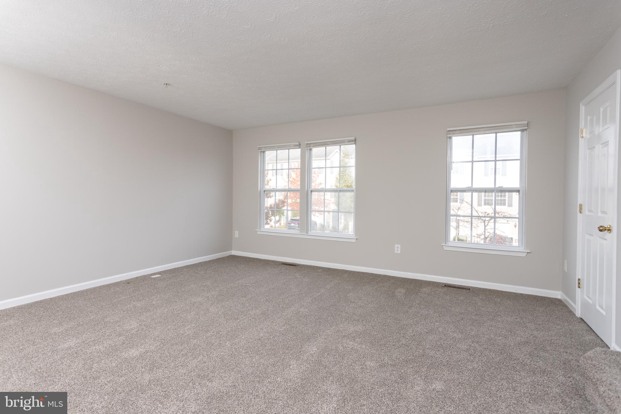 9899 Decatur Road Baltimore, MD 21220 - Photo 14 of 30 an empty room with windows