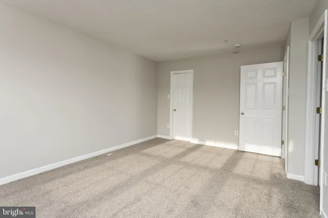 an empty room with an entryway