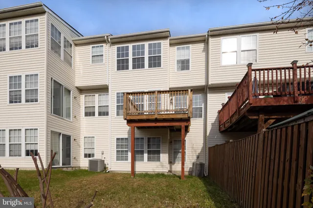 a view of a house with a window and stairs