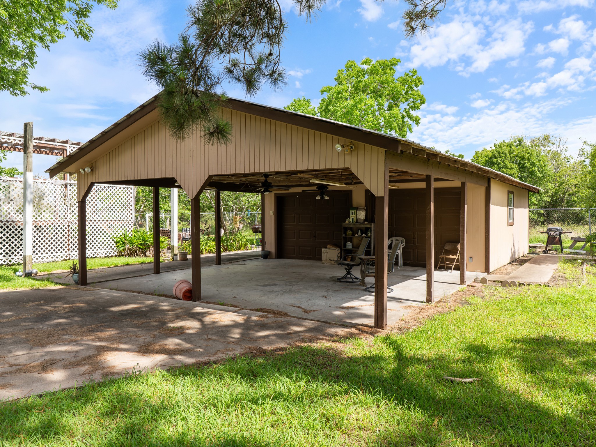 182 Smith Road Palacios, TX 77465 - Photo 22 of 23 a view of a house with backyard porch and sitting area