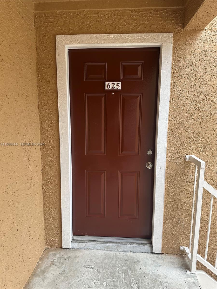 15560 Southwest 104th Terrace, Unit 625 Miami, FL 33196 - Photo 5 of 14 a view of wooden door